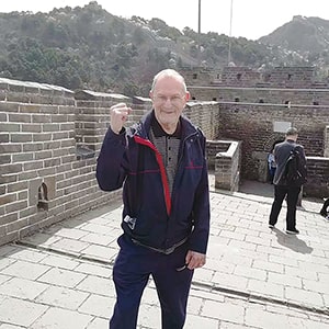 85 years old traveler on the Great Wall